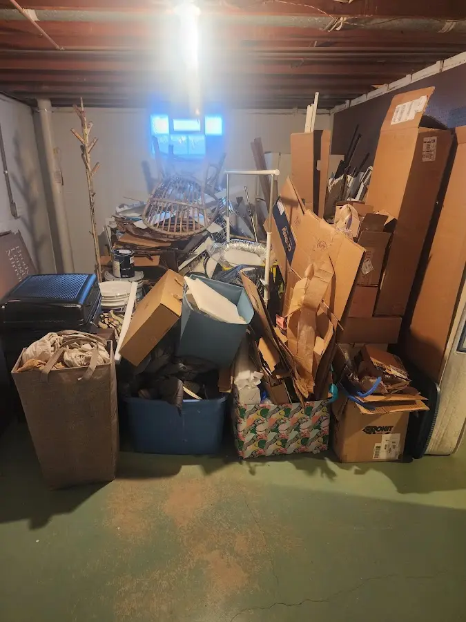 Roll-off dumpster container at job site for 20 Yard Dumpster Rental in Revere